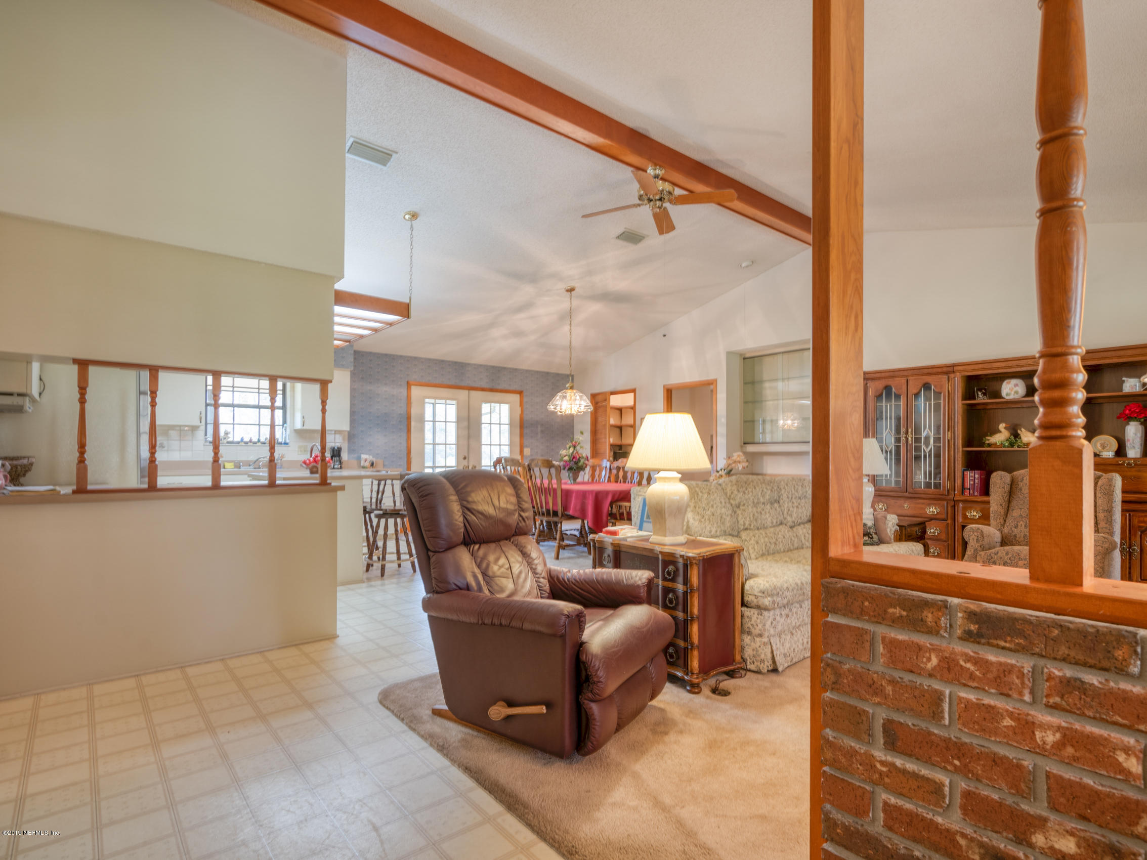 54814 Ogilvie Road Callahan, FL 32011 - Photo 3 of 30 a living room with furniture and a large window