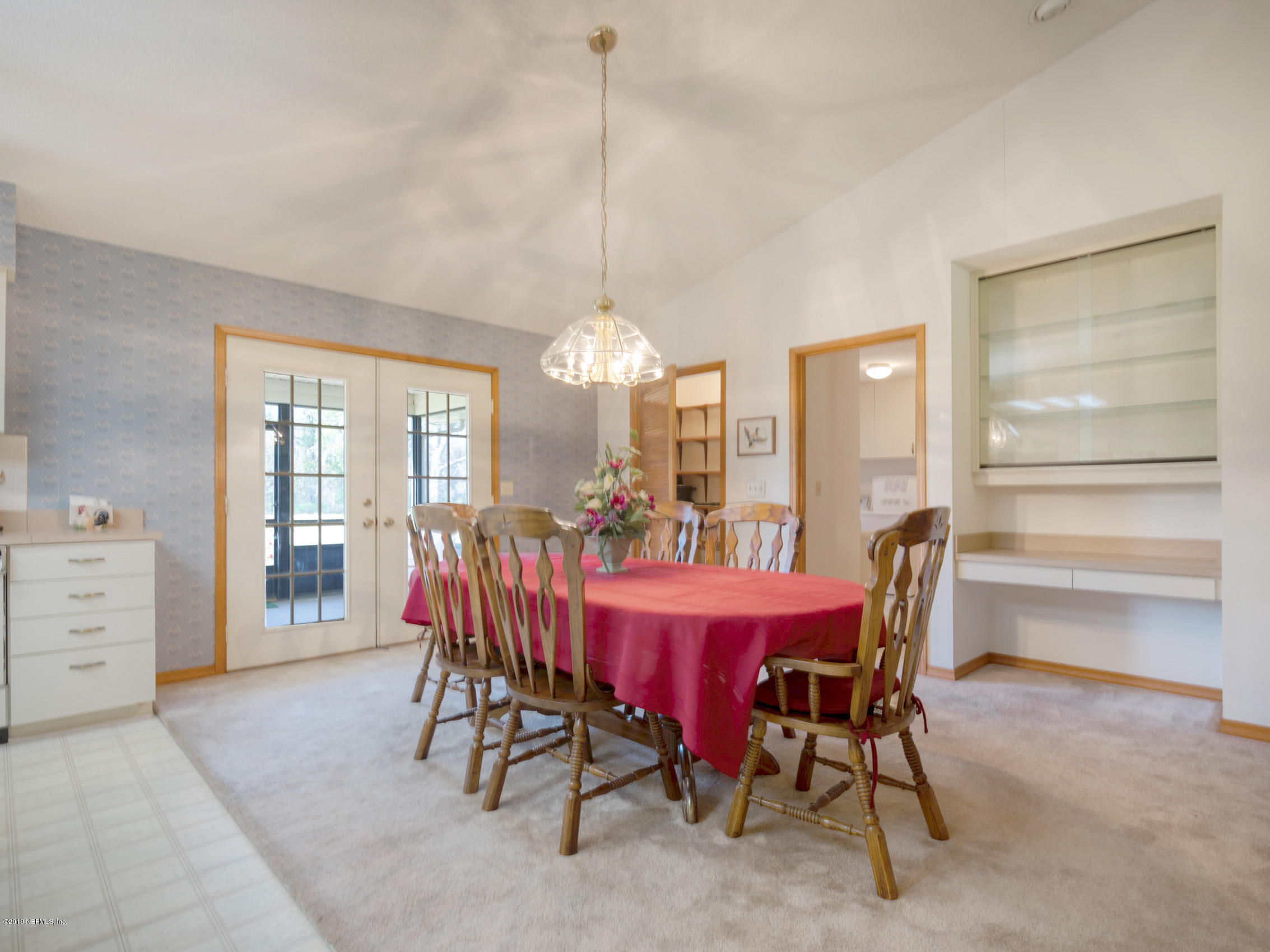 54814 Ogilvie Road Callahan, FL 32011 - Photo 9 of 30 a view of a dining room with furniture