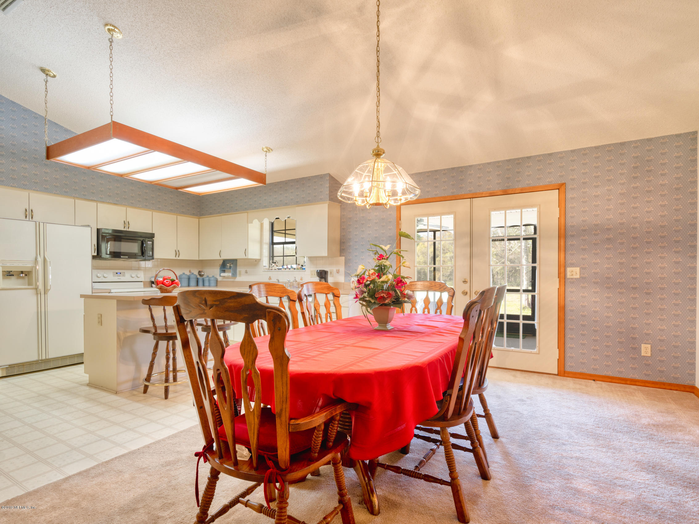 54814 Ogilvie Road Callahan, FL 32011 - Photo 10 of 30 a view of a dining room and livingroom view