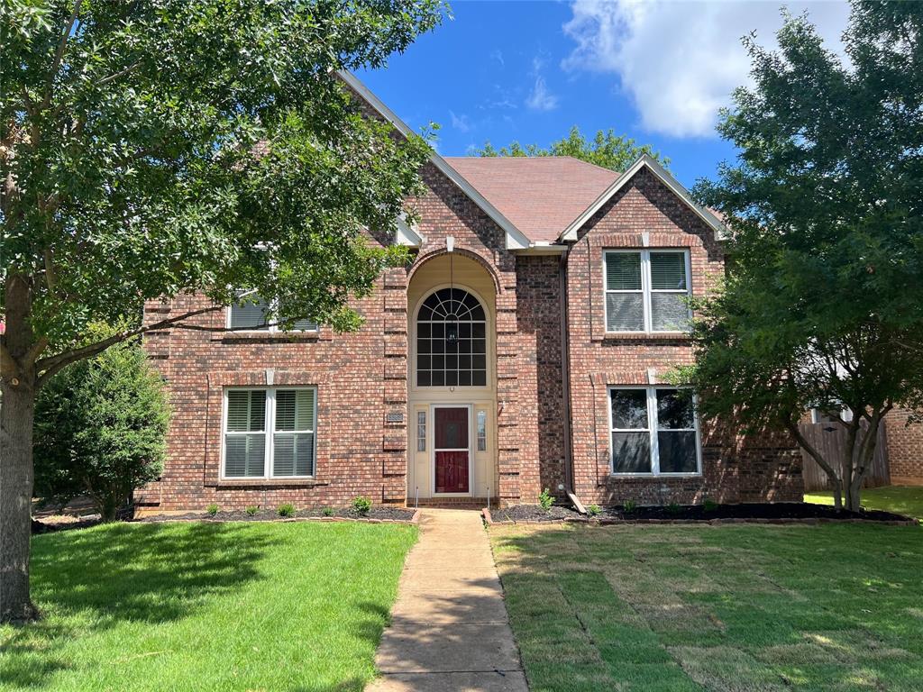 3362 Summerfield Drive Grapevine, TX 76051 - Photo 1 of 1 a front view of a house with a garden