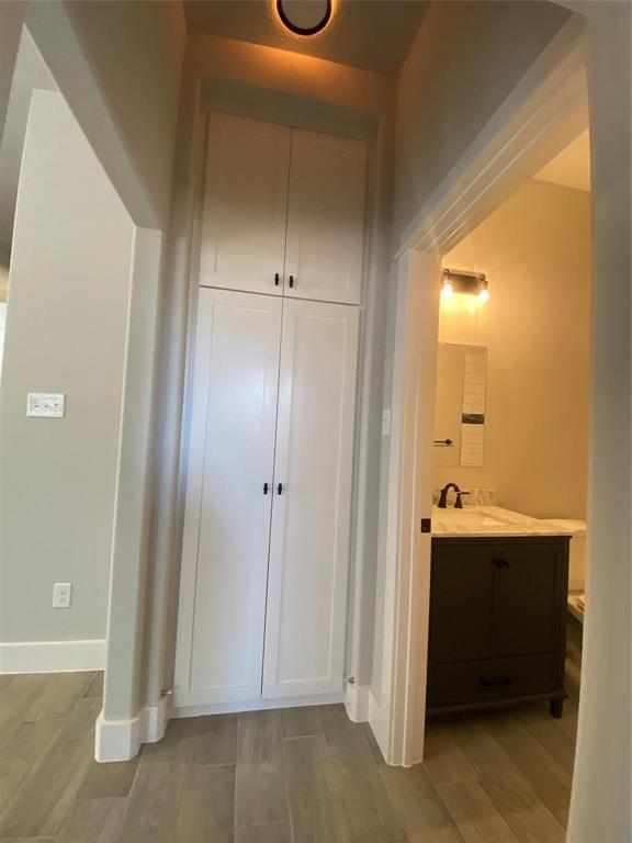 411 Cleveland Road Granbury, TX 76049 - Photo 15 of 21 a view of bathroom with a sink and mirror