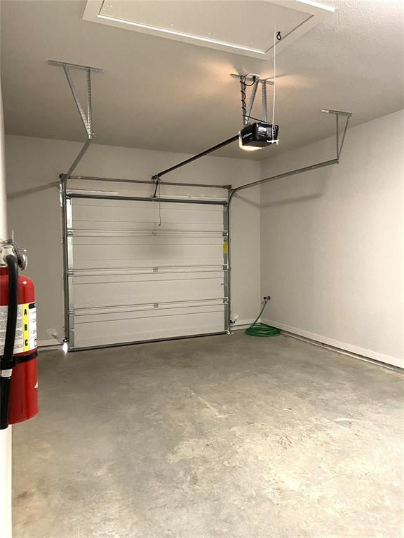 411 Cleveland Road Granbury, TX 76049 - Photo 20 of 21 a view of a garage