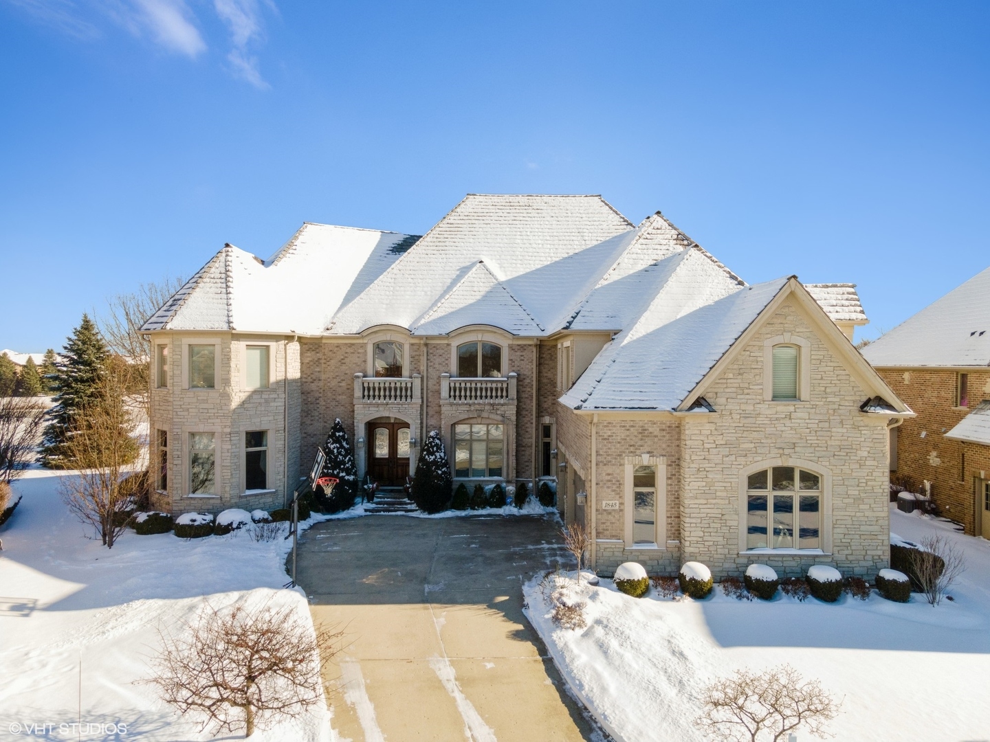 1845 Sawgrass Street Vernon Hills, IL 60061 - Photo 1 of 59 a front view of a house with a yard