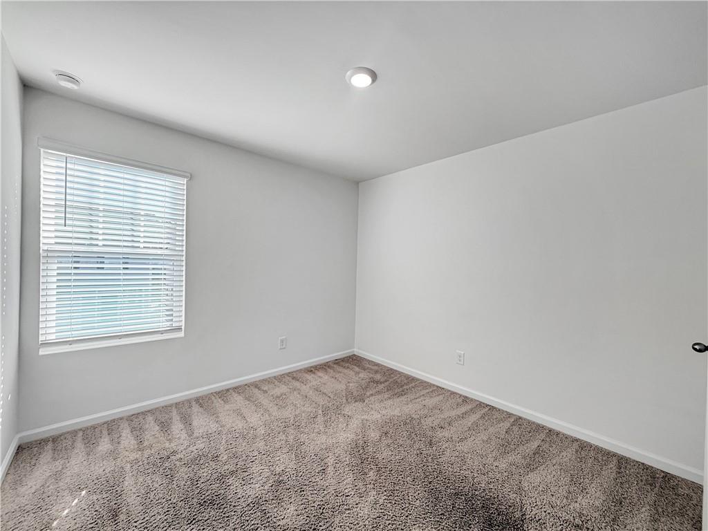 3527 Condor Court Atlanta, GA 30331 - Photo 17 of 21 an empty room with a window