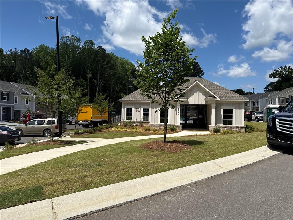 3527 Condor Court Atlanta, GA 30331 - Photo 21 of 21 a front view of a house with a garden and yard