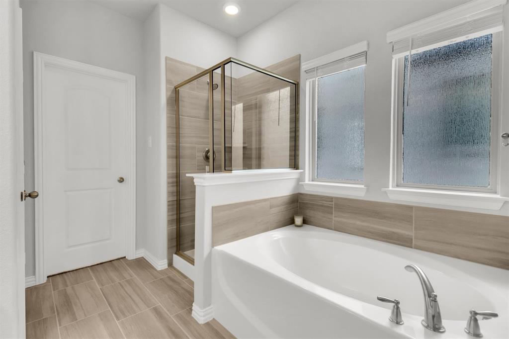 1022 Coppersmith Way Forney, TX 75126 - Photo 14 of 30 Primary Bath room with seperate shower