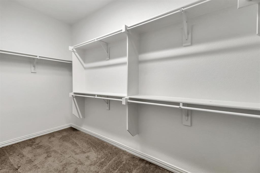 1022 Coppersmith Way Forney, TX 75126 - Photo 17 of 30 Large walk-in primary bedroom closet