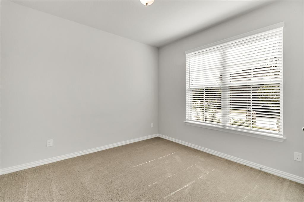 1022 Coppersmith Way Forney, TX 75126 - Photo 24 of 30 Downstairs bedroom or study