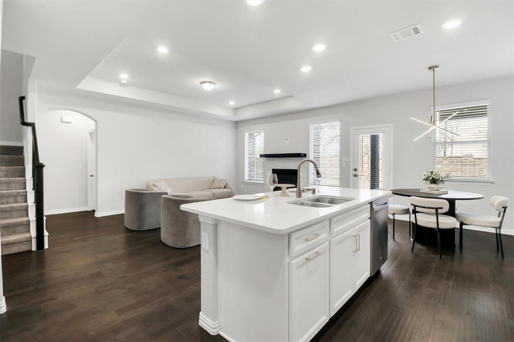 1022 Coppersmith Way Forney, TX 75126 - Photo 7 of 30 Kitchen Island and dining area