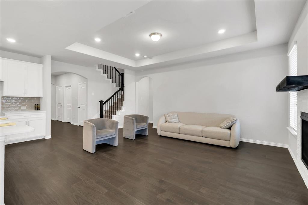 1022 Coppersmith Way Forney, TX 75126 - Photo 8 of 30 Open spacious living room with natural light