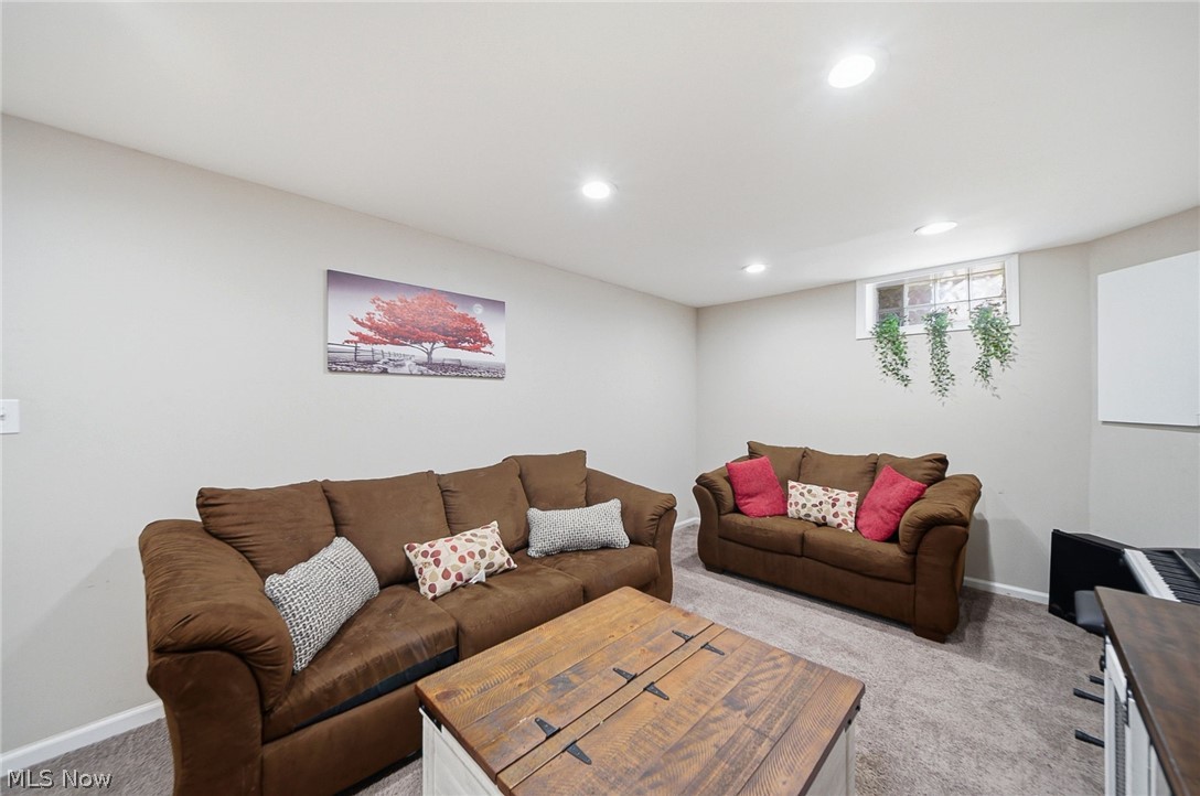 3905 Kent Road Stow, OH 44224 - Photo 29 of 45 Living room with light colored carpet and recessed lighting