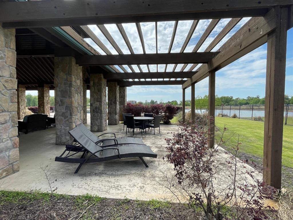 2712 Tbd Private Rd Mount Mount Pleasant, TX 75455 - Photo 11 of 15 a living room with large windows