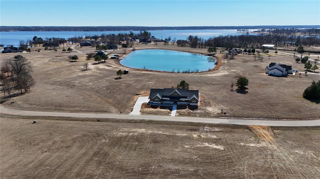 2712 Tbd Private Rd Mount Mount Pleasant, TX 75455 - Photo 2 of 15 an aerial view of a house with outdoor space