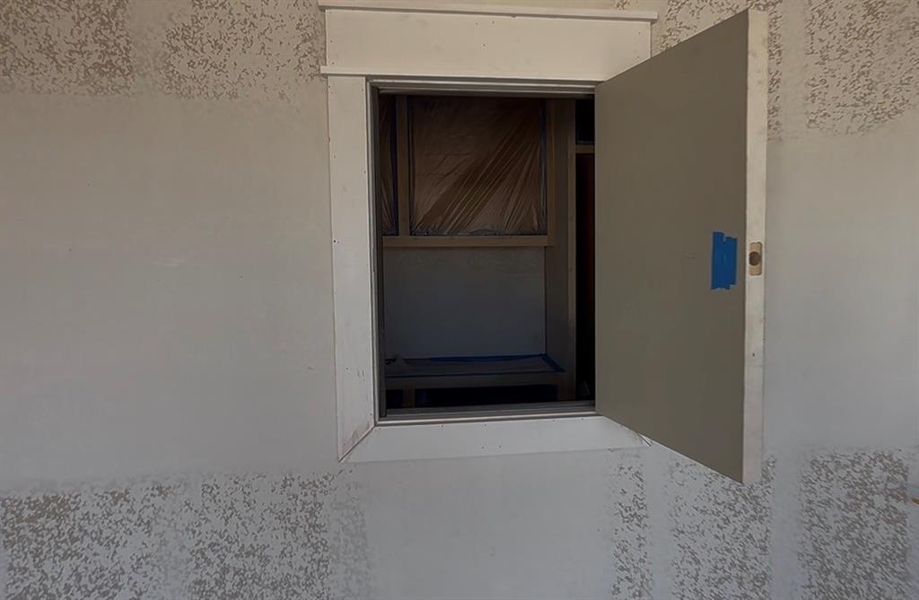 2712 Tbd Private Rd Mount Mount Pleasant, TX 75455 - Photo 3 of 15 a view of wooden door