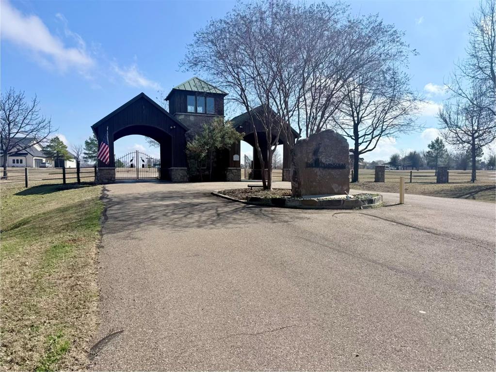 2712 Tbd Private Rd Mount Mount Pleasant, TX 75455 - Photo 7 of 15 a view of a house with a yard covered in snow