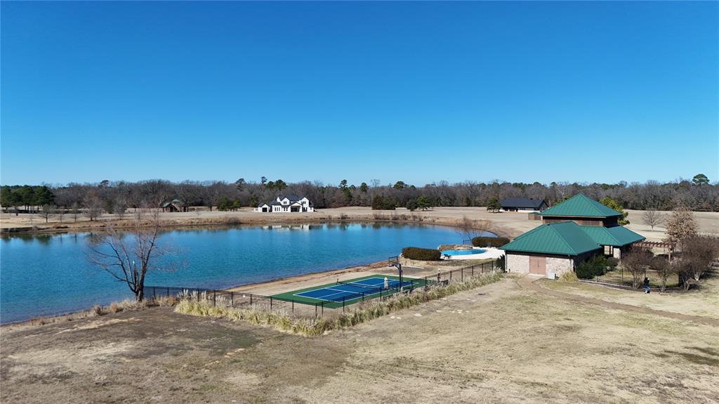 2712 Tbd Private Rd Mount Mount Pleasant, TX 75455 - Photo 8 of 15 a view of a lake with outdoor space