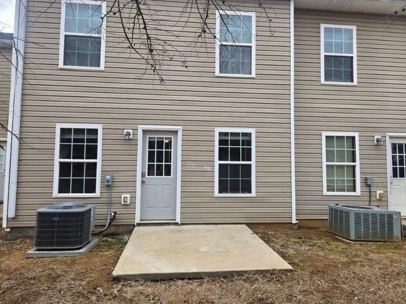 40 Middlebrook Drive Cartersville, GA 30120 - Photo 18 of 18 a view of a house with a large window and wooden fence