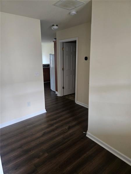 40 Middlebrook Drive Cartersville, GA 30120 - Photo 3 of 18 a view of a hallway with wooden floor and stairs