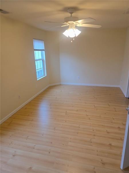 40 Middlebrook Drive Cartersville, GA 30120 - Photo 9 of 18 a view of an empty room with window and wooden floor