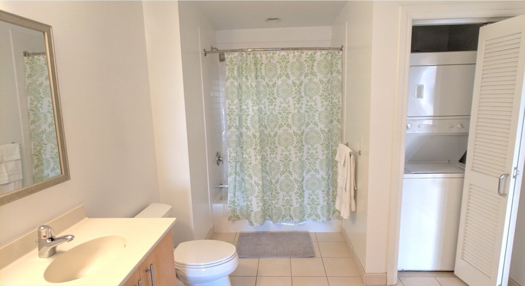 175 Blossom Street, Unit 4 Boston, MA 02114 - Photo 5 of 5 a bathroom with a sink toilet and shower