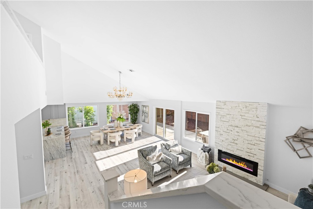 39 Cape Cod Irvine, CA 92620 - Photo 30 of 56 a living room with furniture fireplace and flat screen tv