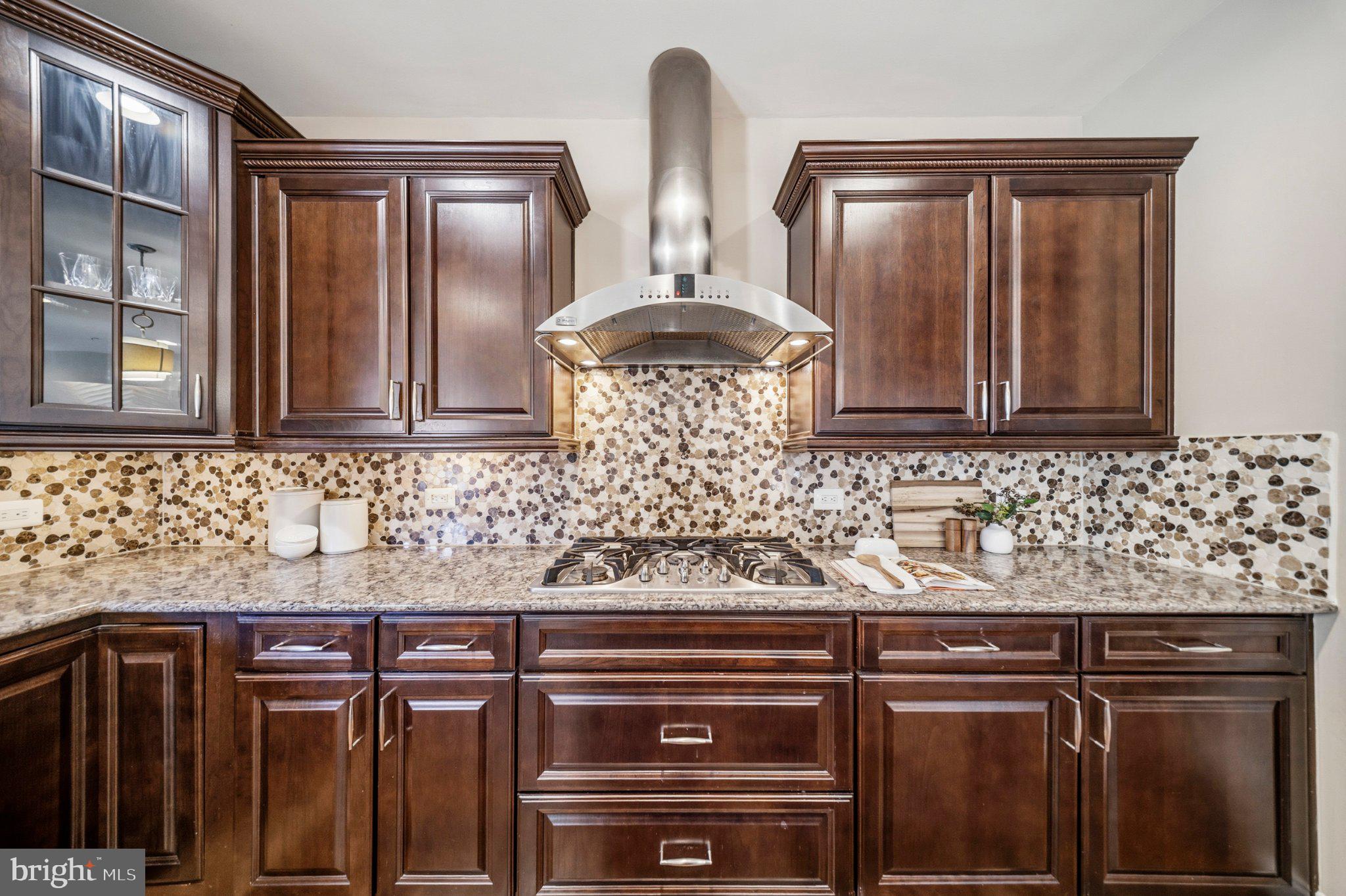 731 Holden Road Frederick, MD 21701 - Photo 30 of 78 Elegant kitchen with rich wood tones.