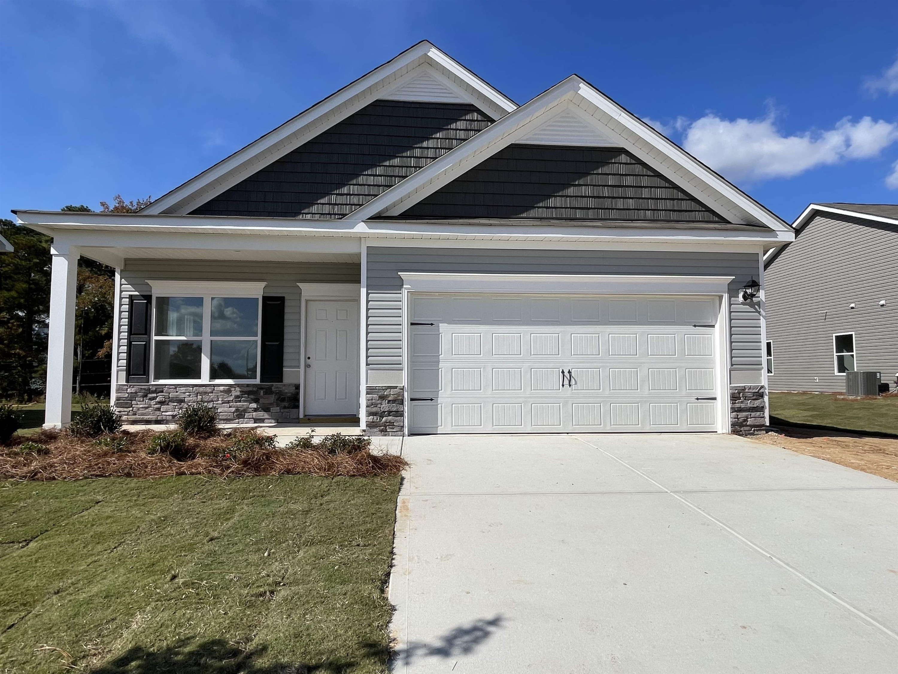 534 Troy Drive Sanford, NC 27332 - Photo 1 of 15 a front view of a house with sitting area