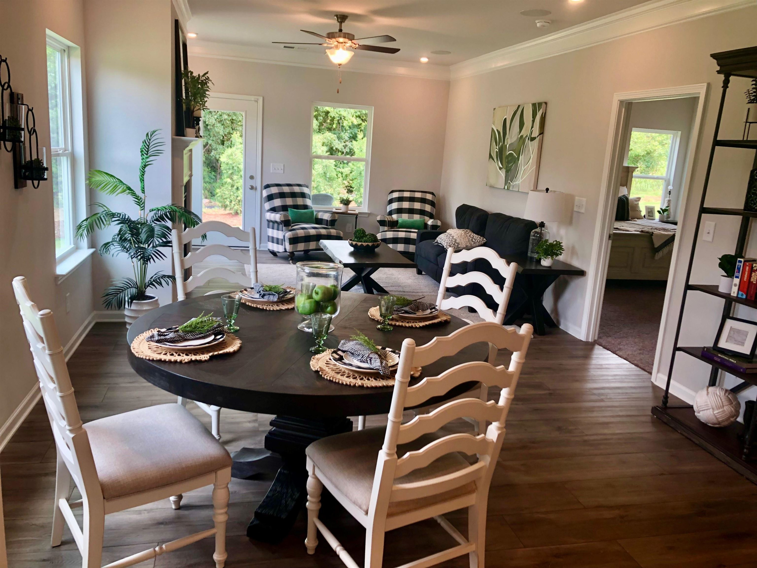 534 Troy Drive Sanford, NC 27332 - Photo 11 of 15 a view of a dining room with furniture window and wooden floor