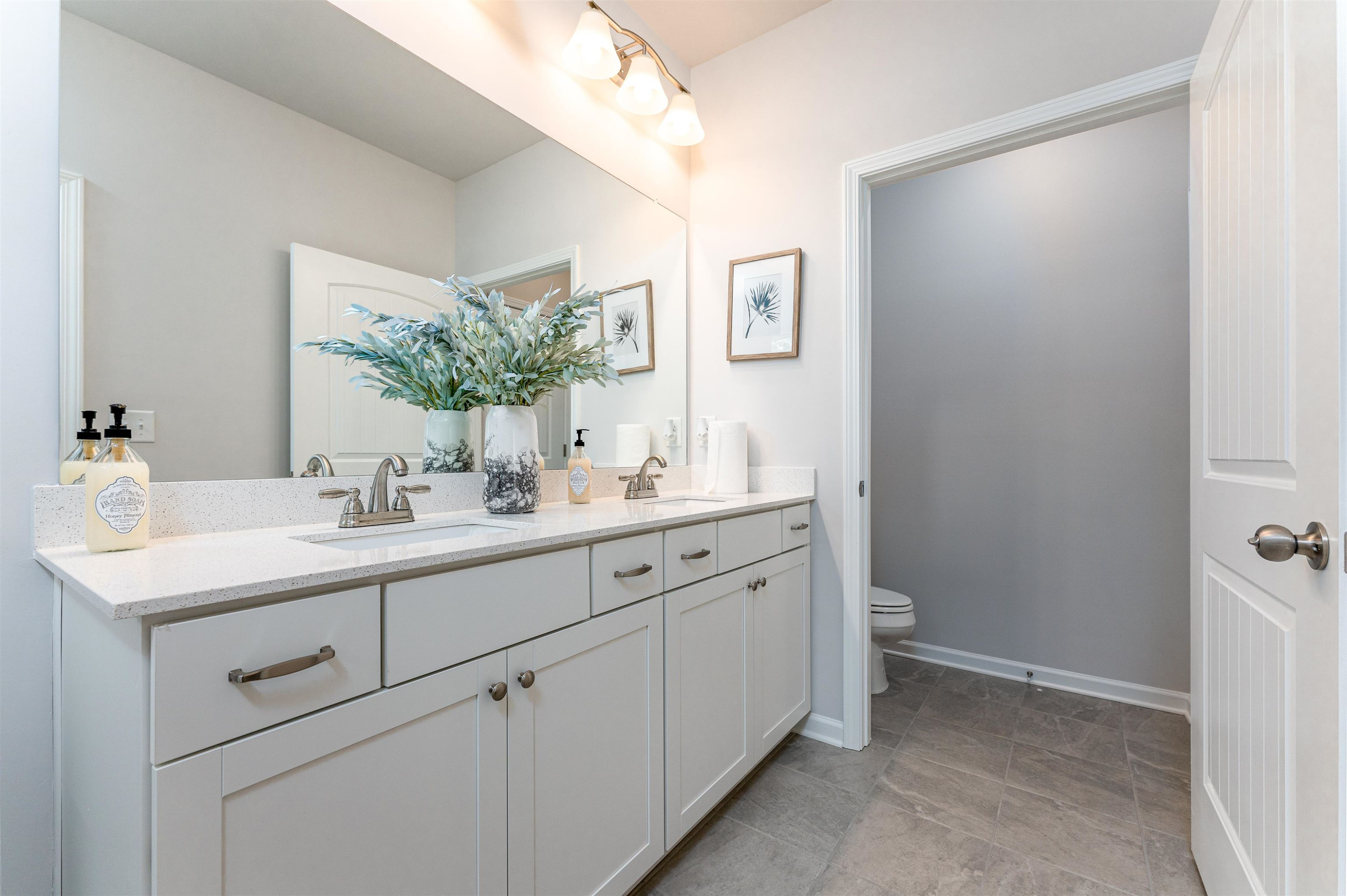 534 Troy Drive Sanford, NC 27332 - Photo 12 of 15 a bathroom with a sink and a mirror
