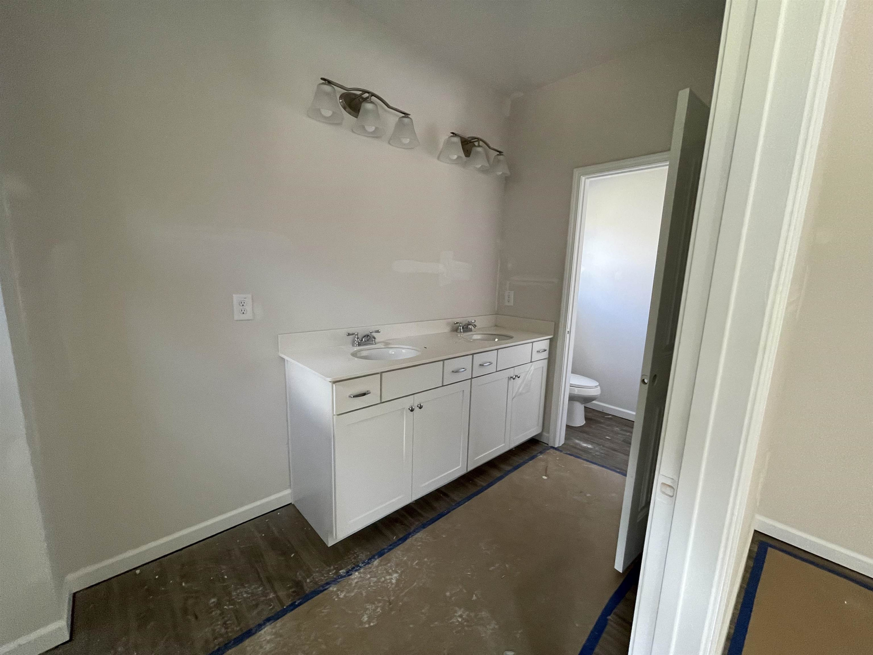 534 Troy Drive Sanford, NC 27332 - Photo 13 of 15 a utility room with cabinets washer and dryer