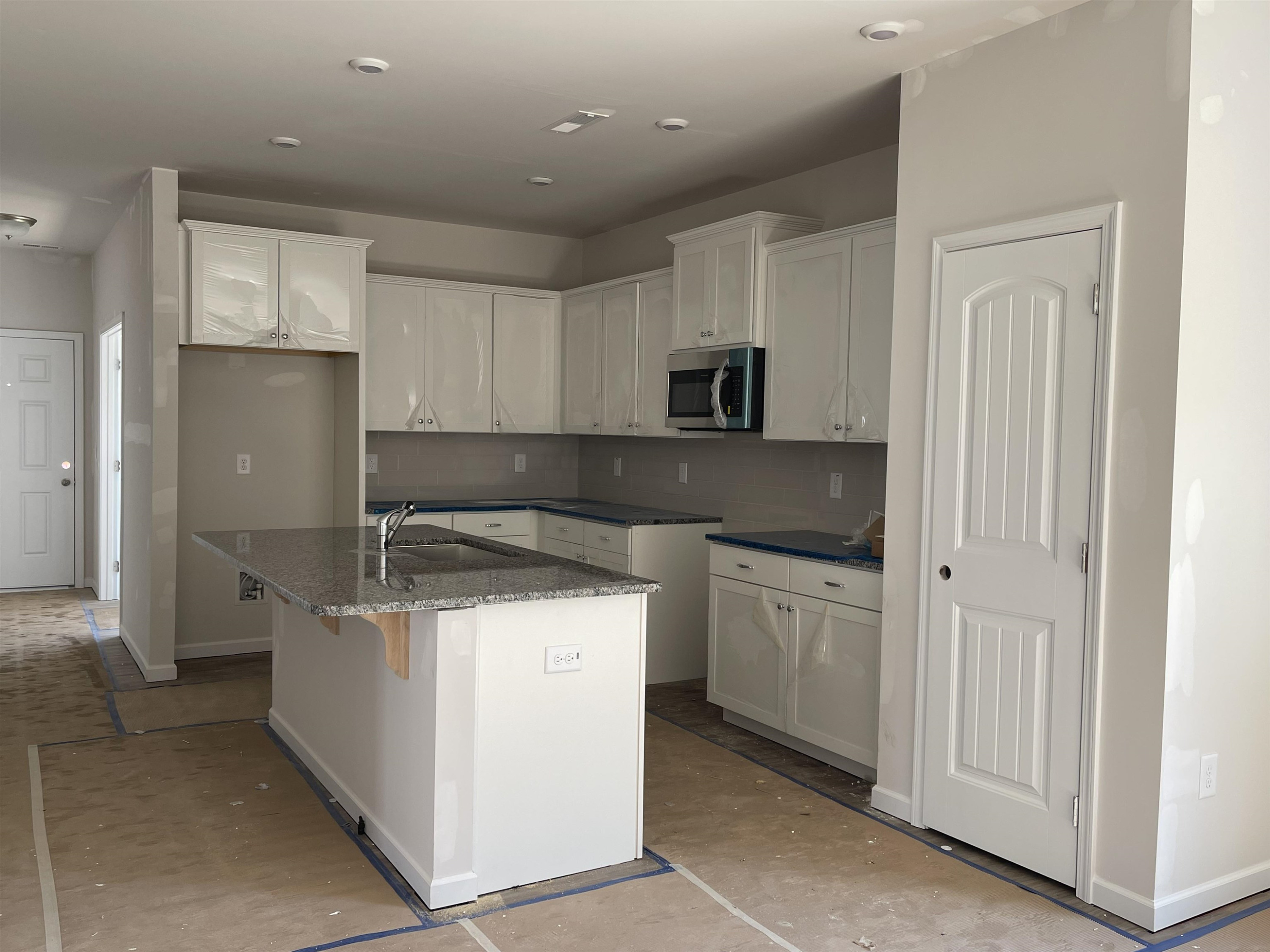 534 Troy Drive Sanford, NC 27332 - Photo 5 of 15 a kitchen with a sink stove and refrigerator