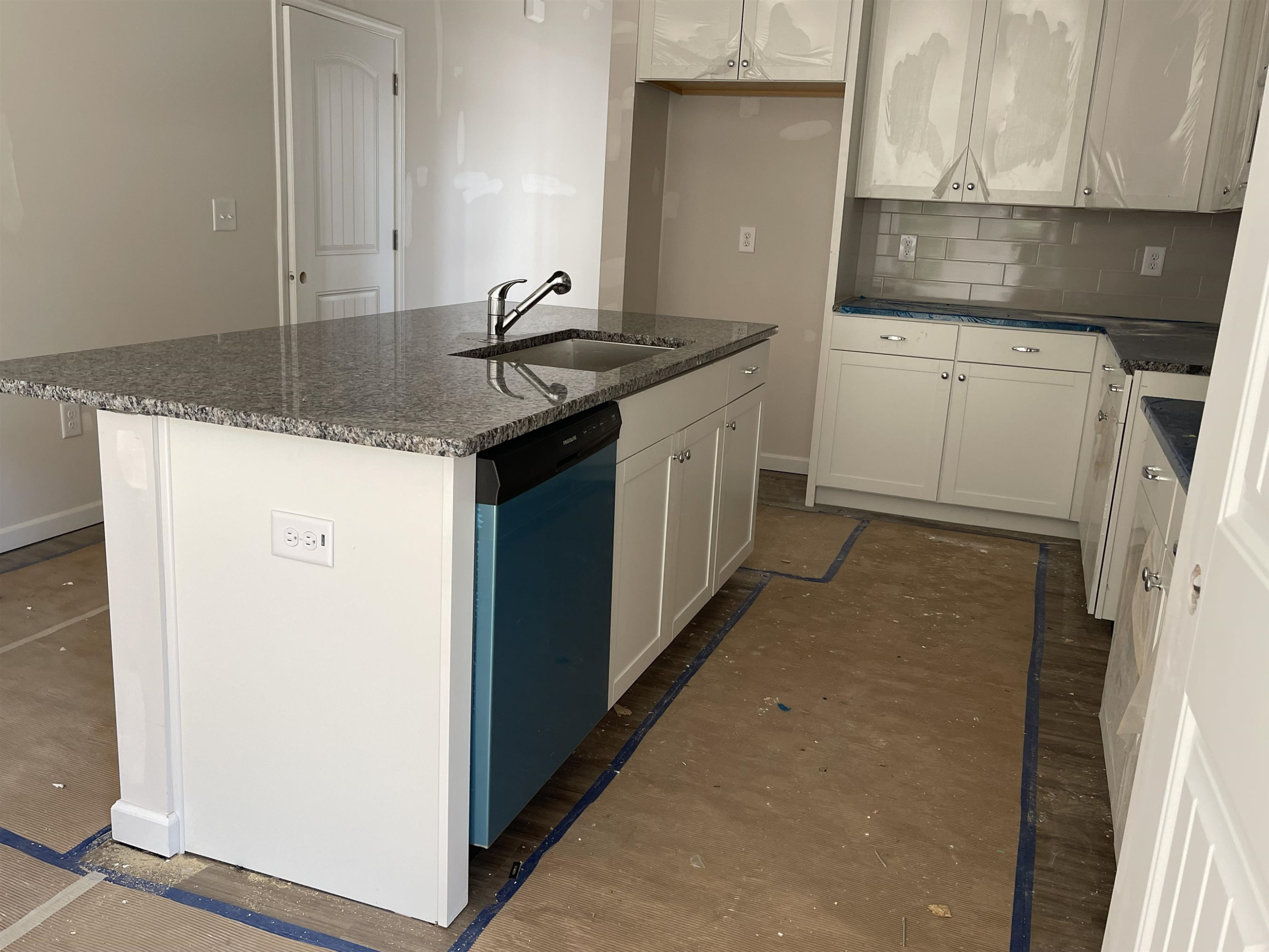 534 Troy Drive Sanford, NC 27332 - Photo 6 of 15 a kitchen with sink stove and cabinets
