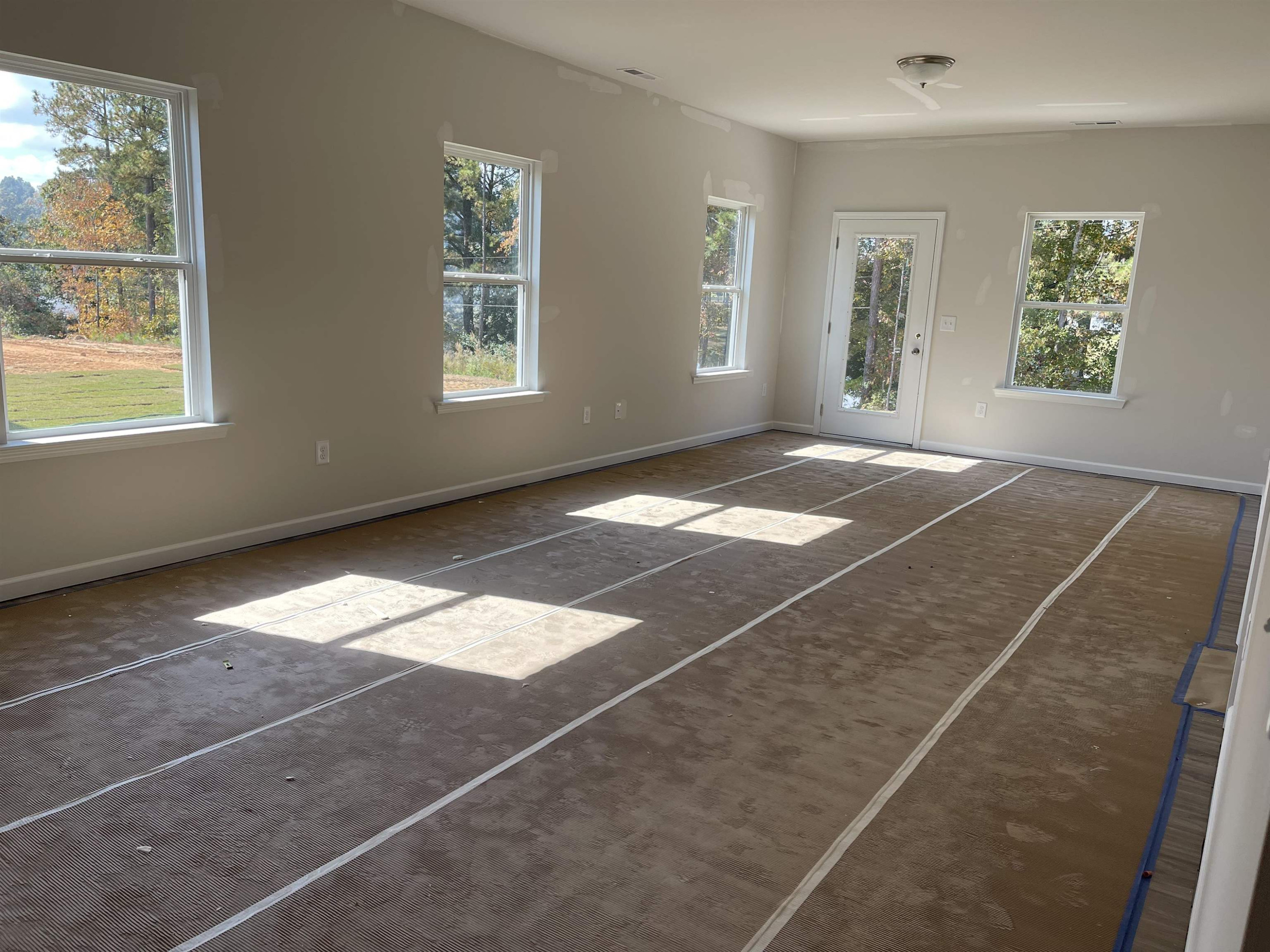 534 Troy Drive Sanford, NC 27332 - Photo 9 of 15 a view of empty room with windows