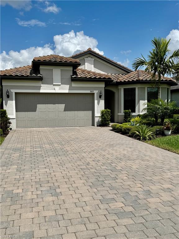 19855 Beverly Park Road Estero, FL 33928 - Photo 16 of 42 a view of a house with a yard