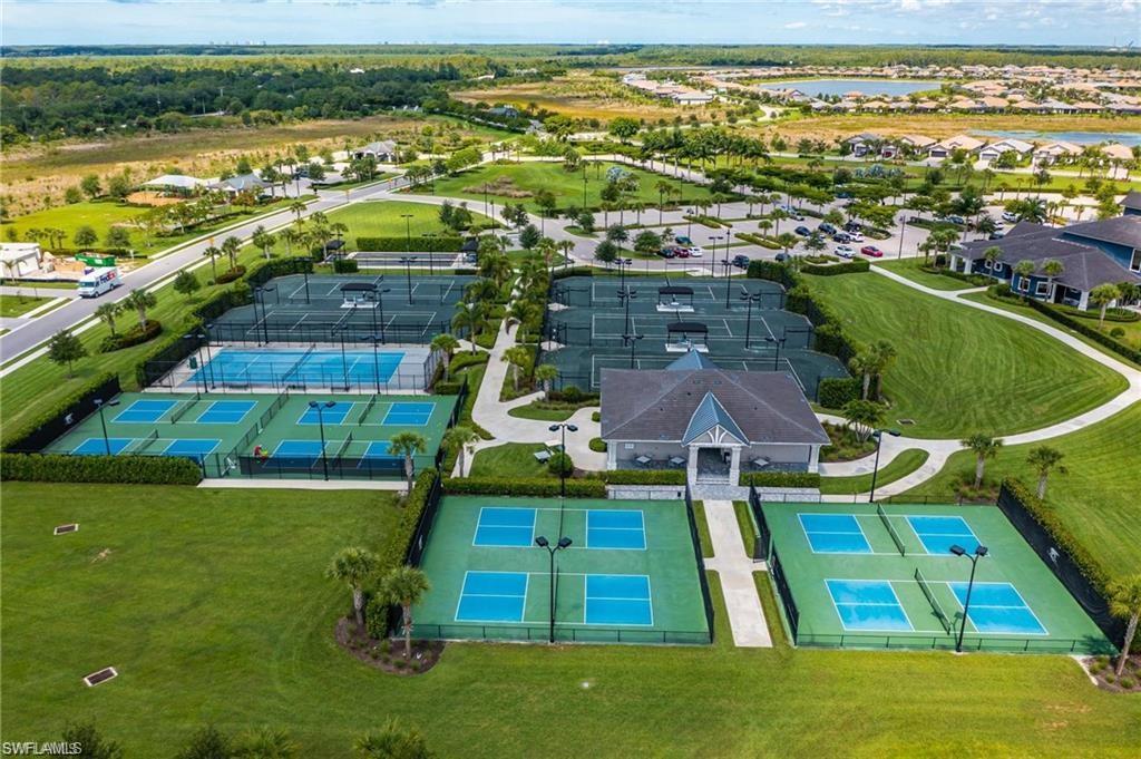 19855 Beverly Park Road Estero, FL 33928 - Photo 33 of 42 an aerial view of residential houses with outdoor space and swimming pool