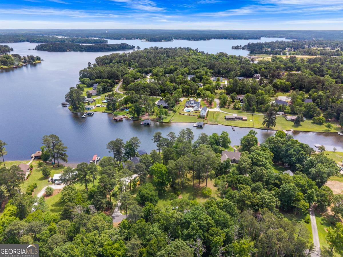 151 Bill Johnson Road Northeast Milledgeville, GA 31061 - Photo 22 of 27 view of a lake with houses