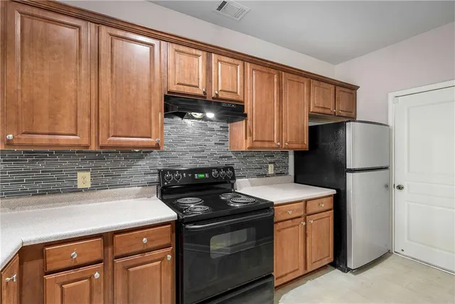 a view of a bathroom with a glass door