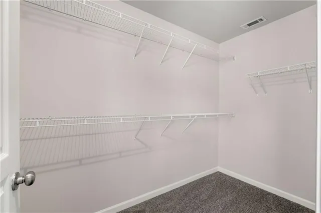 a view of a bathroom from a hallway