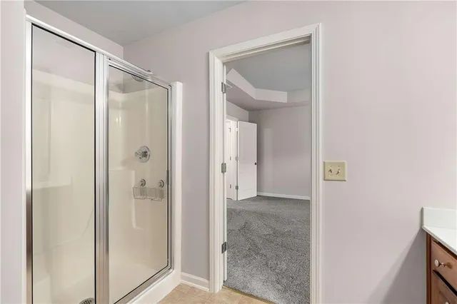 a bathroom with a sink a toilet and bathtub