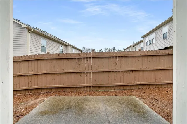a view of a house with entrance gate