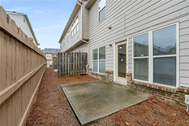 an aerial view of residential building with swimming pool