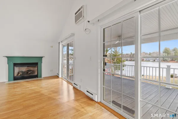 a view of an empty room with a balcony