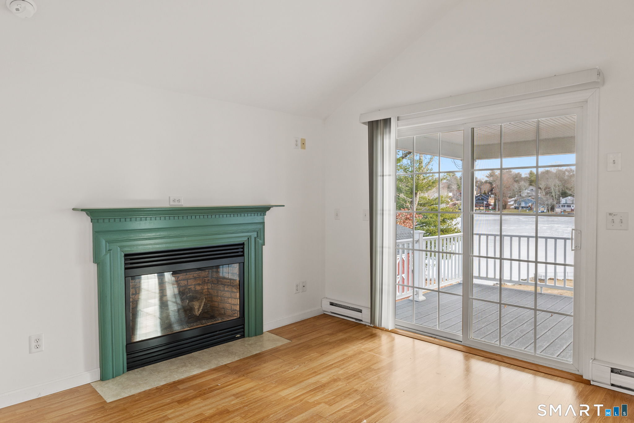 120 Kenwood Road Griswold, CT 06351 - Photo 15 of 34 a view of an empty room with wooden floor and a window