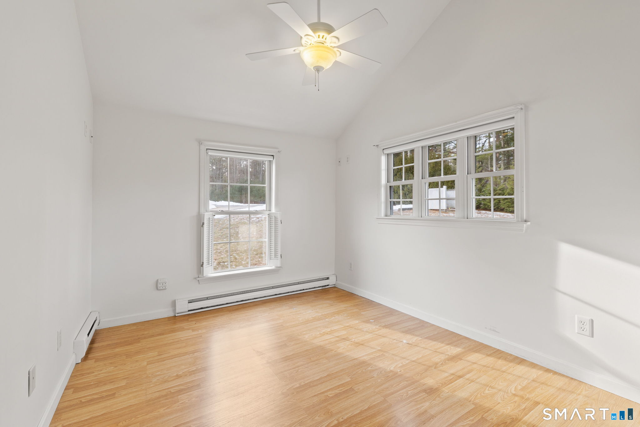120 Kenwood Road Griswold, CT 06351 - Photo 18 of 34 an empty room with a window and a ceiling fan