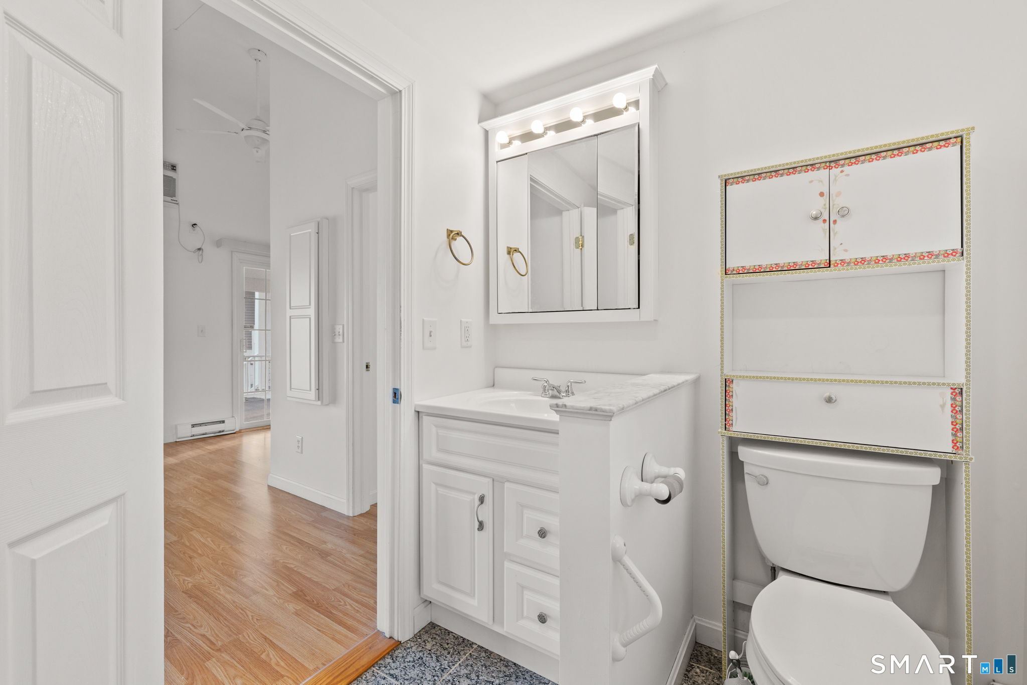 120 Kenwood Road Griswold, CT 06351 - Photo 22 of 34 a bathroom with a toilet a sink and a mirror