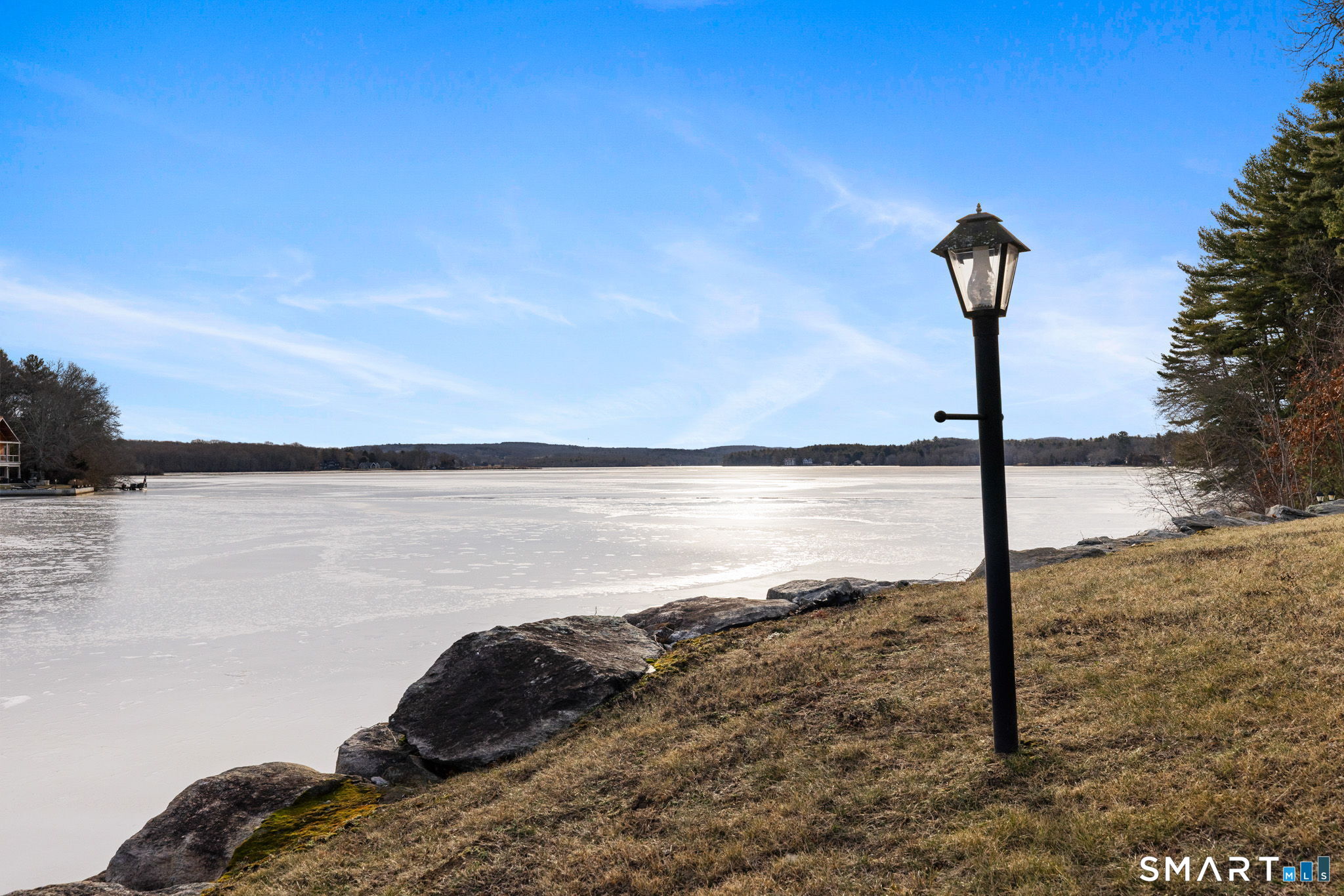 120 Kenwood Road Griswold, CT 06351 - Photo 33 of 34 a lake view with a tree in the background