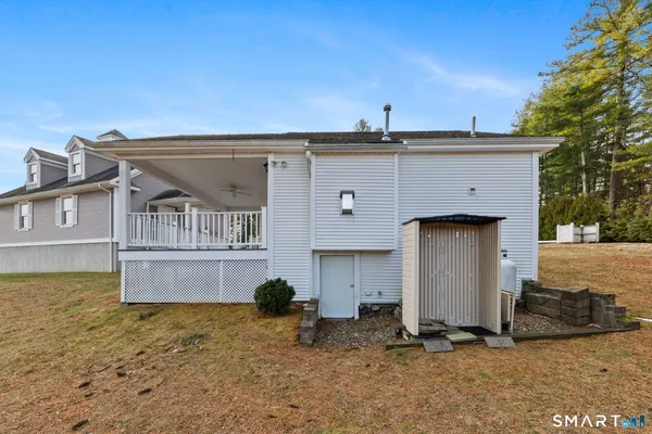 a view of a house with a sink and yard