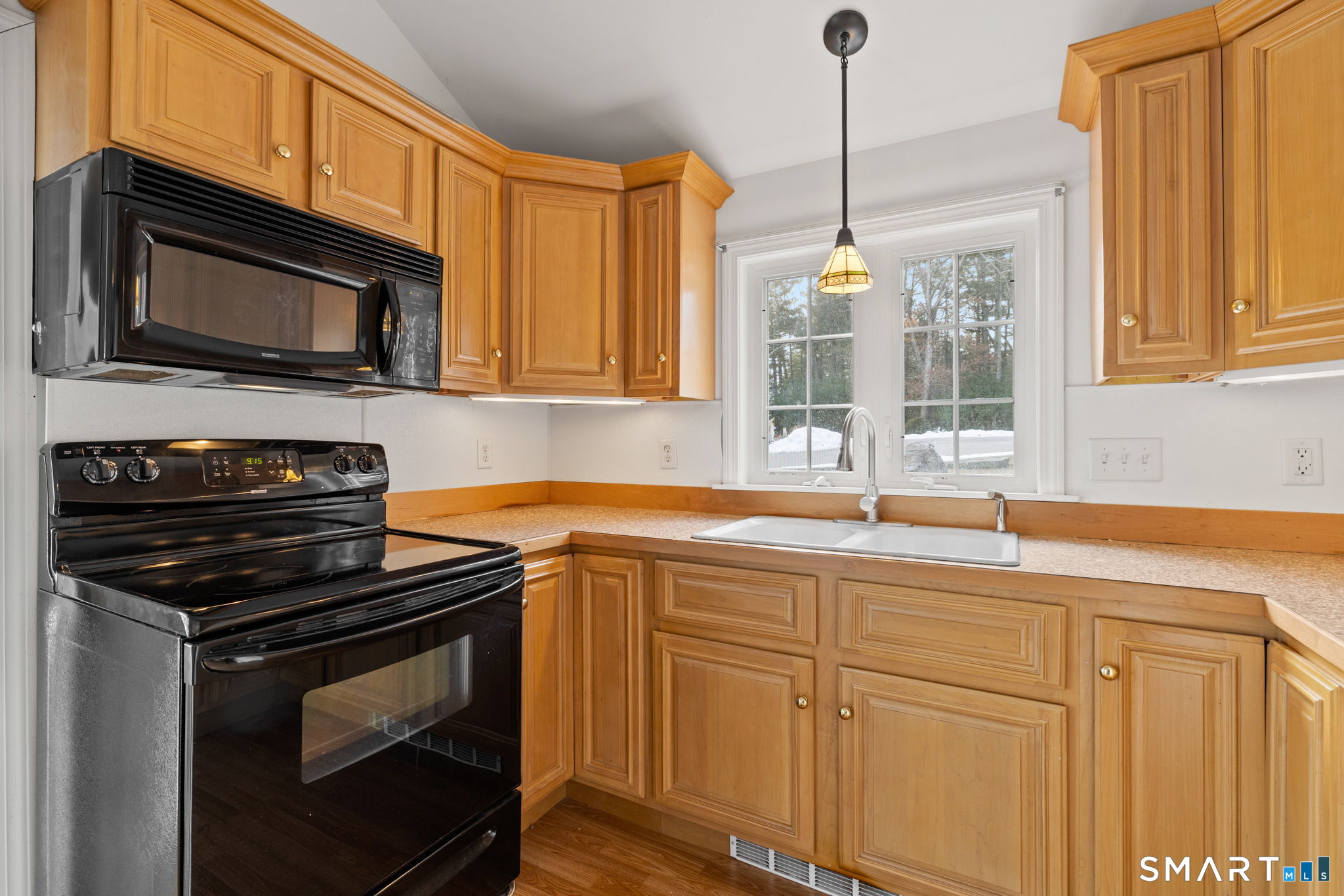 120 Kenwood Road Griswold, CT 06351 - Photo 10 of 34 a kitchen with stainless steel appliances granite countertop white cabinets and a stove