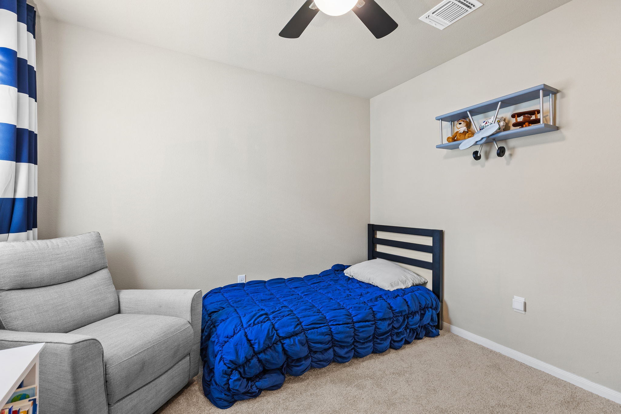404 Cassandra Drive Hutto, TX 78634 - Photo 22 of 40 Bedroom with carpet floors and a ceiling fan