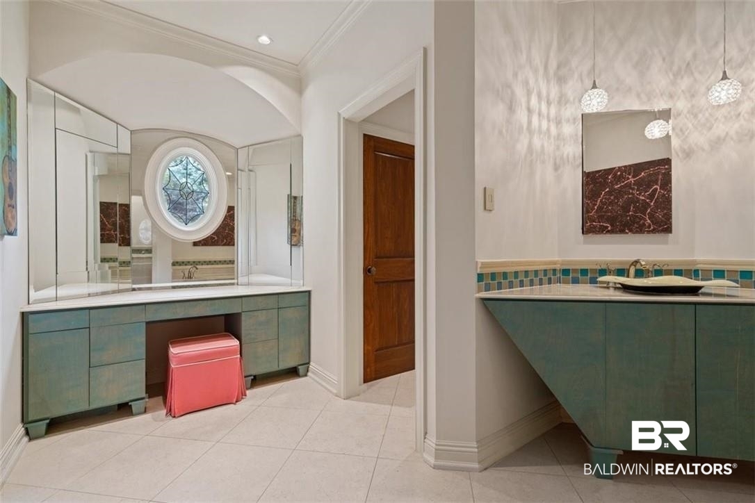 4 Chancery Court Mobile, AL 36608 - Photo 29 of 54 Bathroom featuring vanity, ornamental molding, and tile patterned floors
